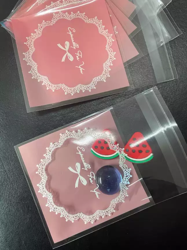 كيس تغليف بلاستيك هدية حديث عقدة الفراشة و نمط زهر هدية الى منزل 100 قطعة